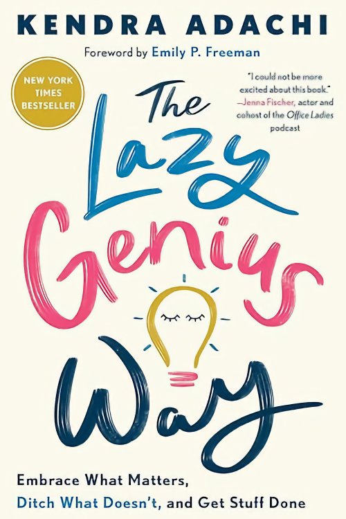 Cover of the book The Lazy Genius Way by Kendra Adachi, featuring playful hand-lettered text in blue and pink with a lightbulb illustration, and the subtitle “Embrace What Matters, Ditch What Doesn’t, and Get Stuff Done.”